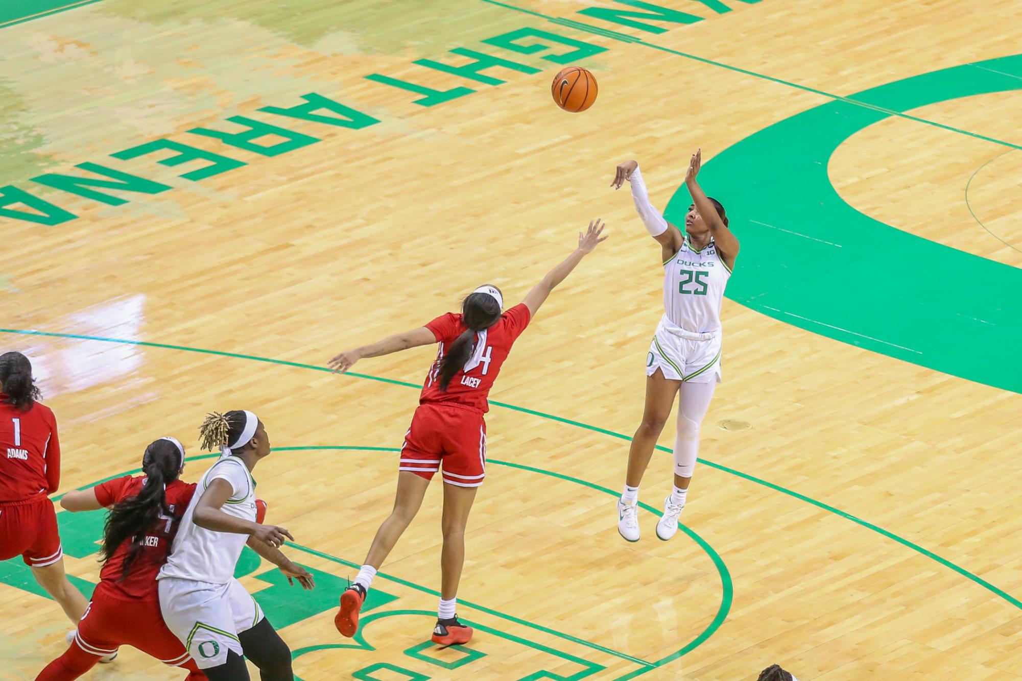 Deja Kelly (25) steps back for a jump shot over JoJo Lacey (14). Oregon Women’s Basketball takes on Rutgers in Eugene, Ore. on Feb. 23, 2025.
