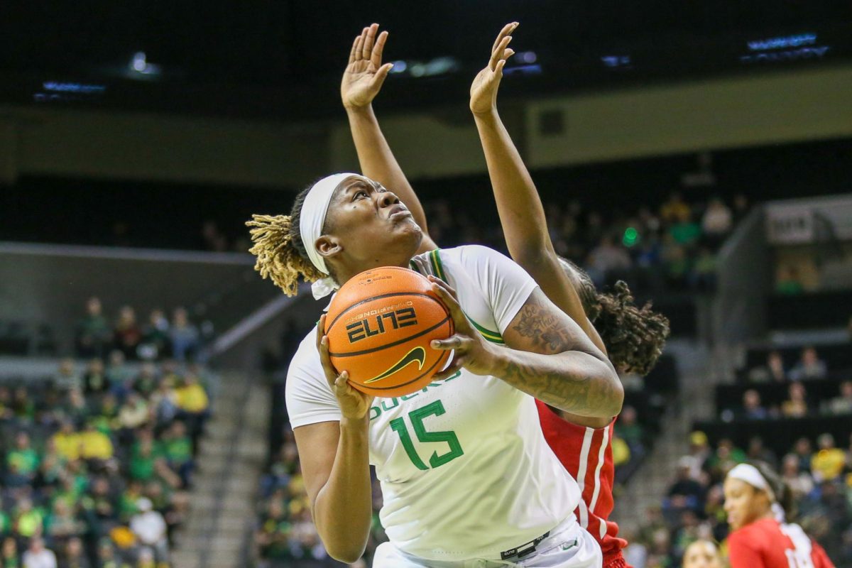 Phillipina Kyei (15) holds the ball strongly. Oregon Women’s Basketball takes on Rutgers in Eugene, Ore. on Feb. 23, 2025.