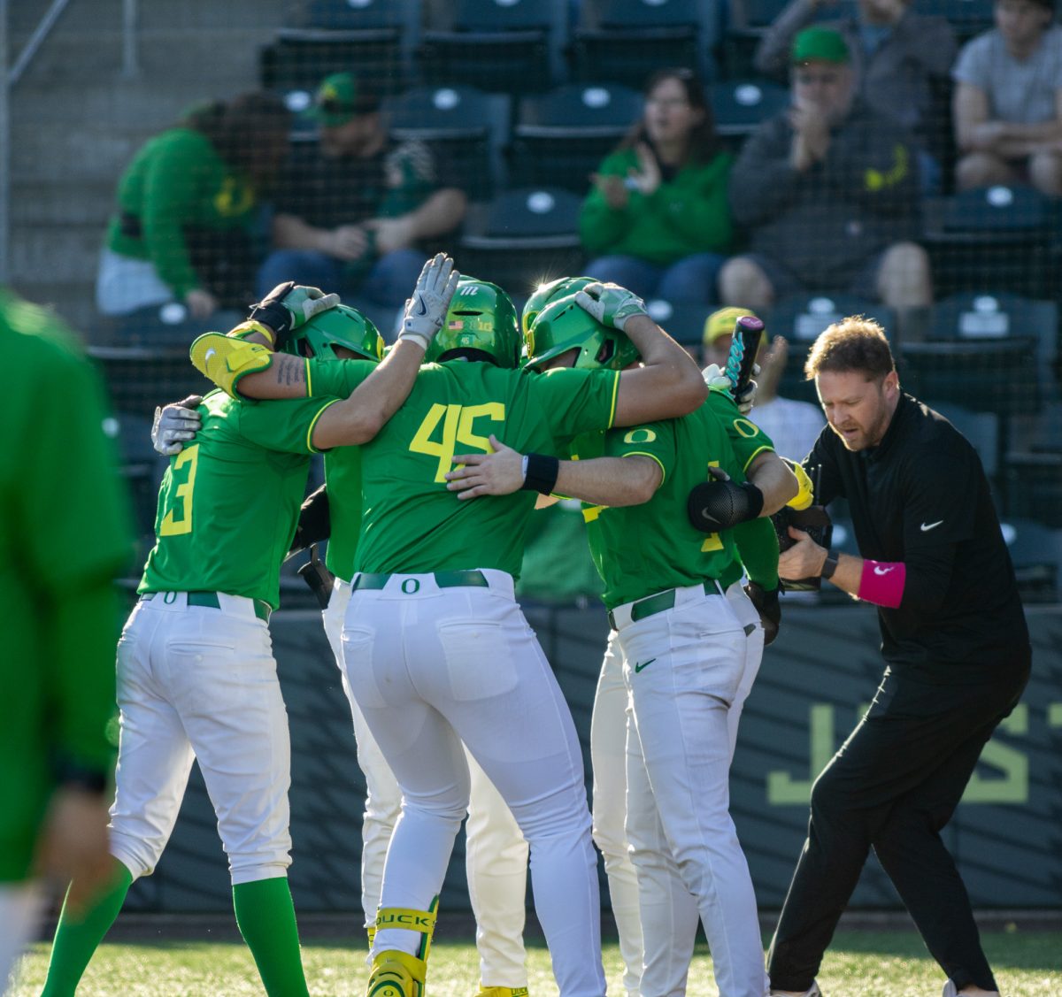 Oregon baseball celebrates after hitting their first home run of the season at PK Park in Eugene, Ore., during their game against Columbia, Feb. 28, 2025.