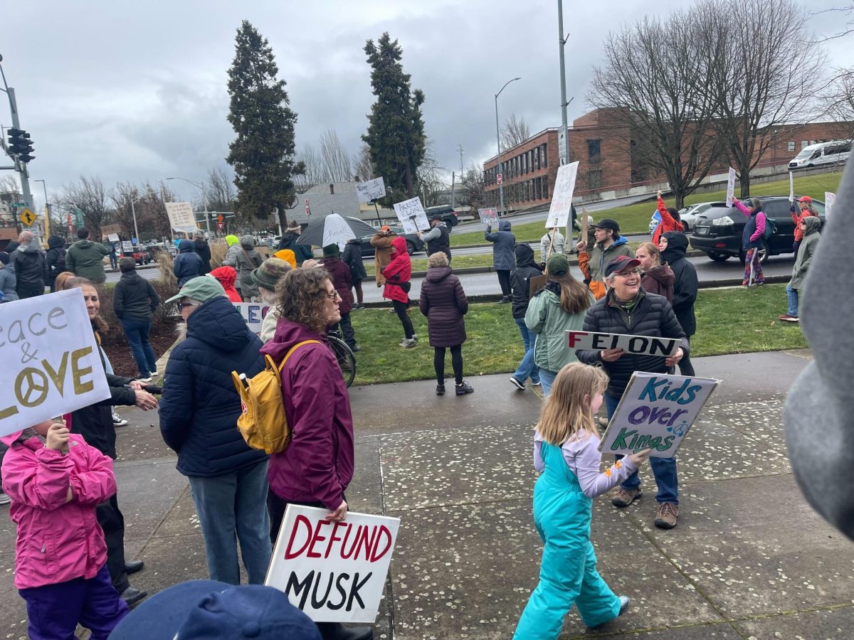 Demonstrators gather in front of the Wayne Morse Courthouse in Eugene to protest President Trump on Feb.17, 2025