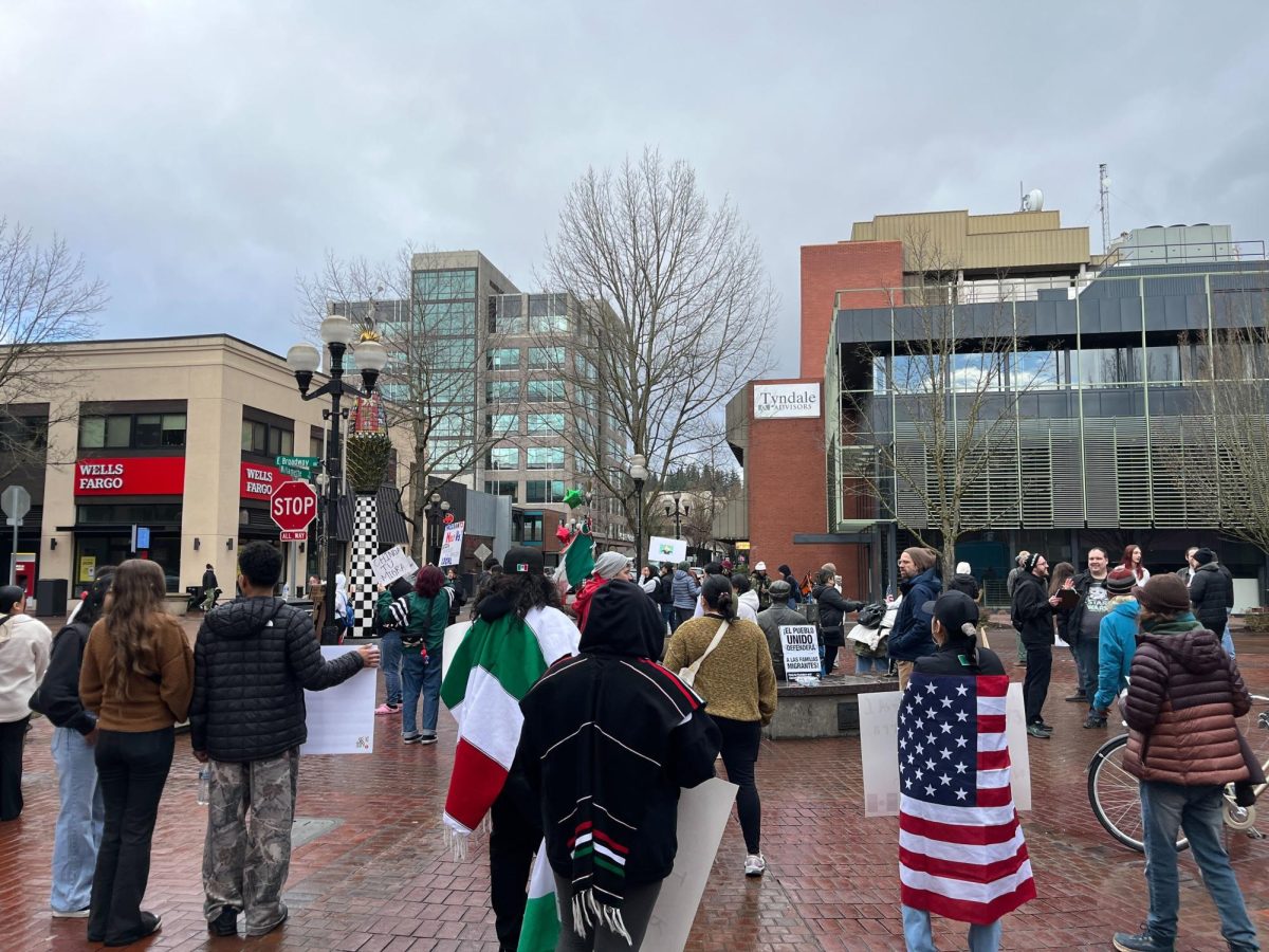 Protesters demonstrate in Downtown Eugene. (Chiu/Emerald)