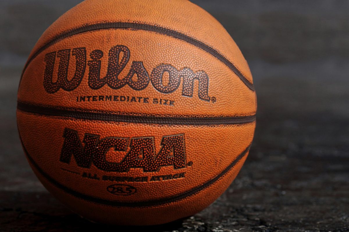 https://unsplash.com/photos/wilson-ncaa-basketball-on-black-board-5nk3wSFUWZc