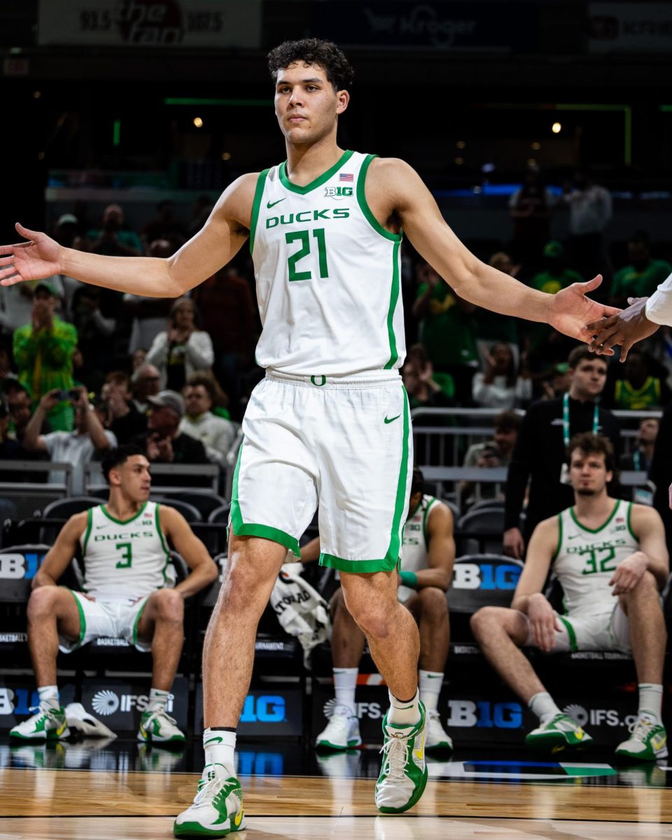 Stanford transfer, Brandon Angel (21), is called up during the starting lineup introductions. The Oregon Ducks take on the Indiana Hoosiers in the second round of the Big Ten Tournament at Gainbridge Fieldhouse in Indianapolis, IN, on March 13, 2025. (Jonathan Suni/Emerald)