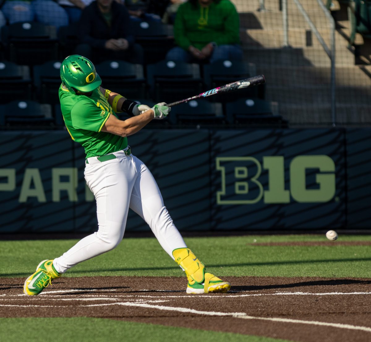 Dominic Hellman (45) hits the ball towards third base during their game against Columbia, Feb. 28, 2025, at PK Park in Eugene, Ore.