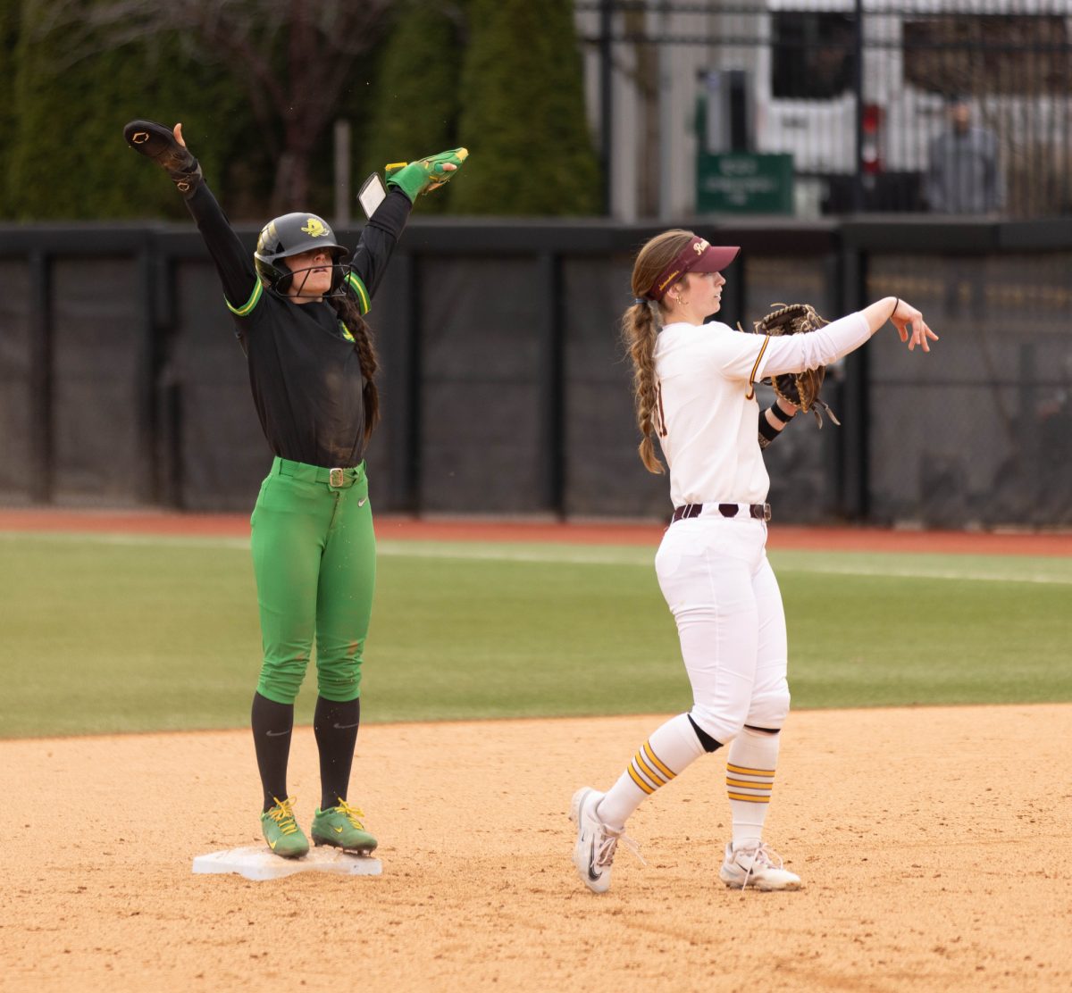 Outfielder Kai Luschar (22) celebrates after stealing second base. The University of Oregon Ducks defeated the Loyola Chicago Ramblers 9-1 on March 2, 2025, at Jane Sanders Stadium. The Ducks Will next play the Flordia State Seminoles on March 8. (Miles Cull/Emerald)