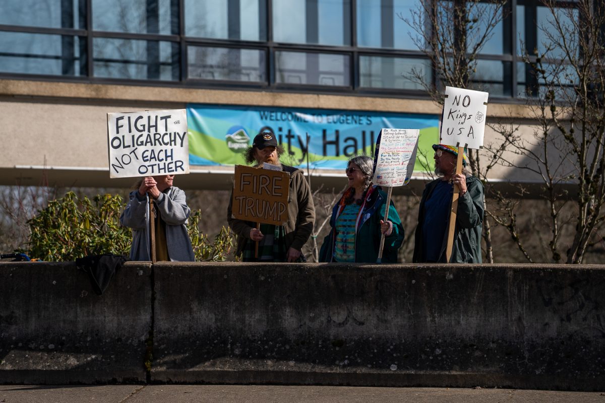 The March 4 America rally was held in front of the Eugene City Hall on Mar 4, 2025 in Eugene, Ore, from 12 p.m to 4 p.m. Participants at the rally stood on either side of East 4th Avenue while holding various signs in support of the movement. (Saj Sundaram/Emerald)