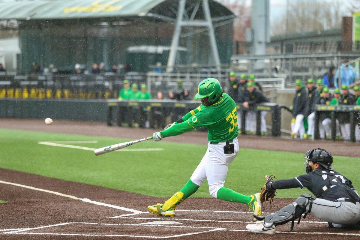 Jeffery Heard (35) drives the ball into right field. Oregon Baseball faces Grand Canyon in Eugene, Ore. on Mar. 12, 2025.