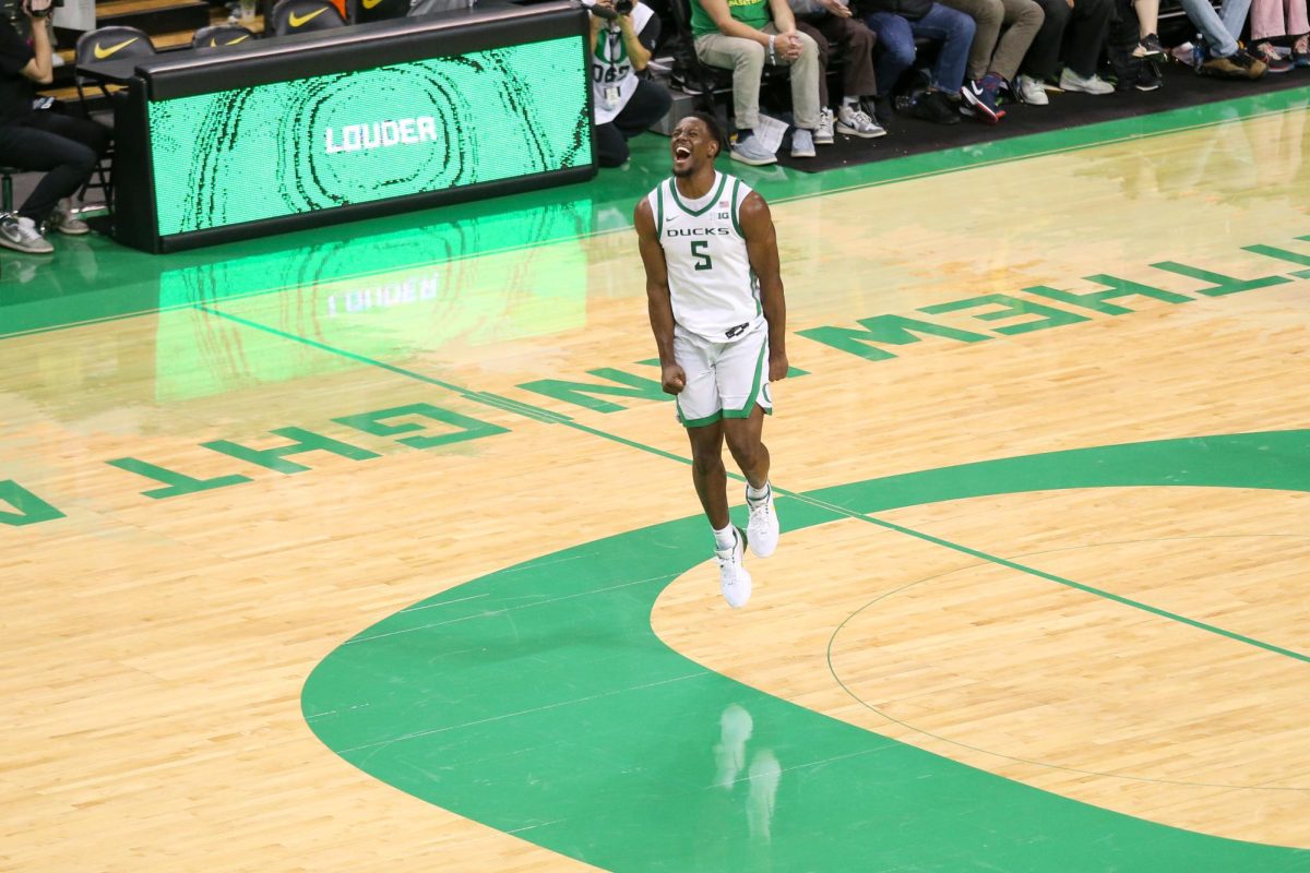 TJ Bamba (5) smiles a mid court after securing the win for Oregon with a crucial defensive possession. Oregon Men’s Basketball takes on Indiana in Eugene, Ore. on Mar. 4, 2025.