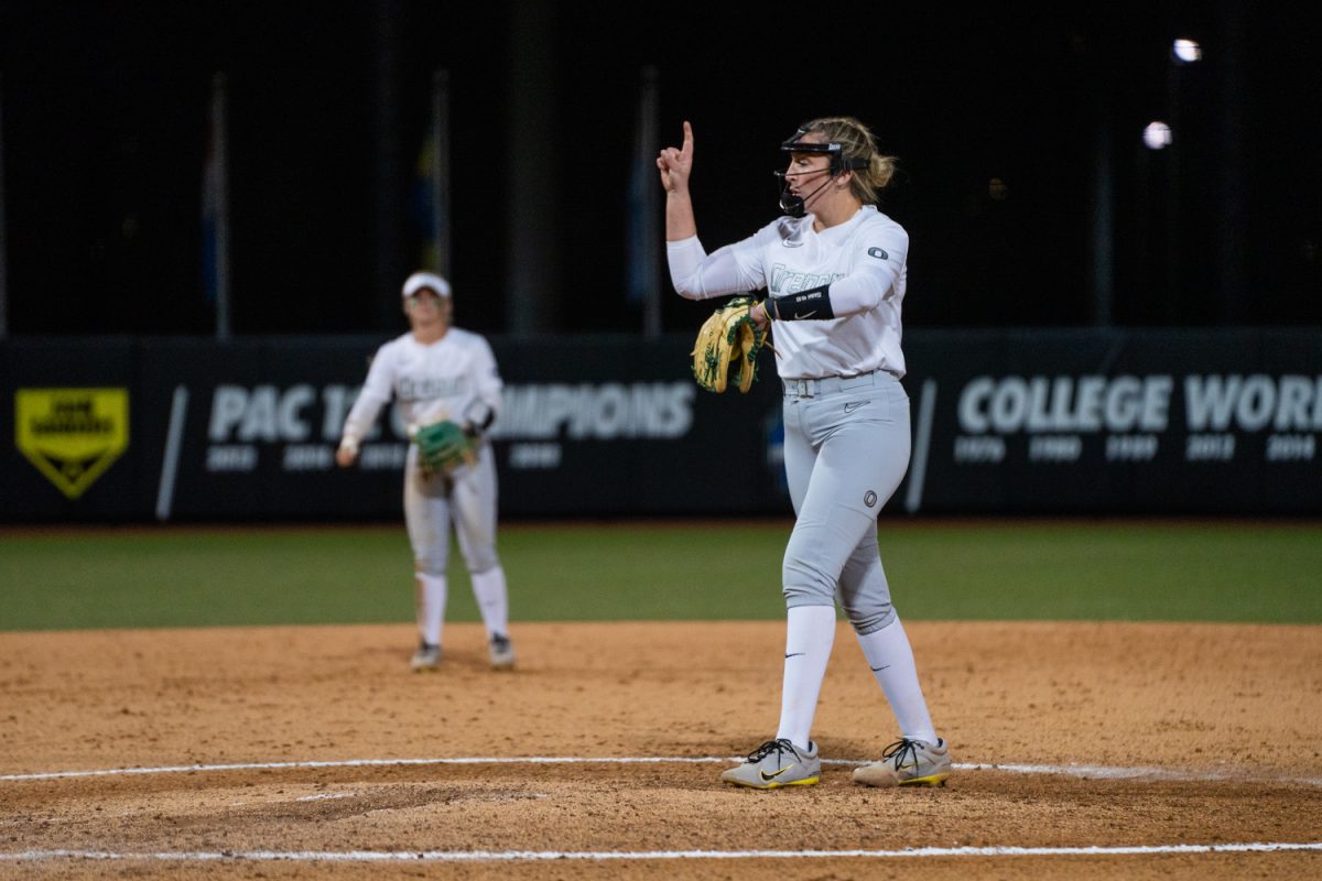 Elise Sokolsky (18) calls a play before pitching. The University of Oregon Ducks Women’s Softball team in a home match against Loyola Chicago at Jane Sanders Field in Eugene, Ore., on Mar. 1, 2025. (Rowan Campbell/Emerald).