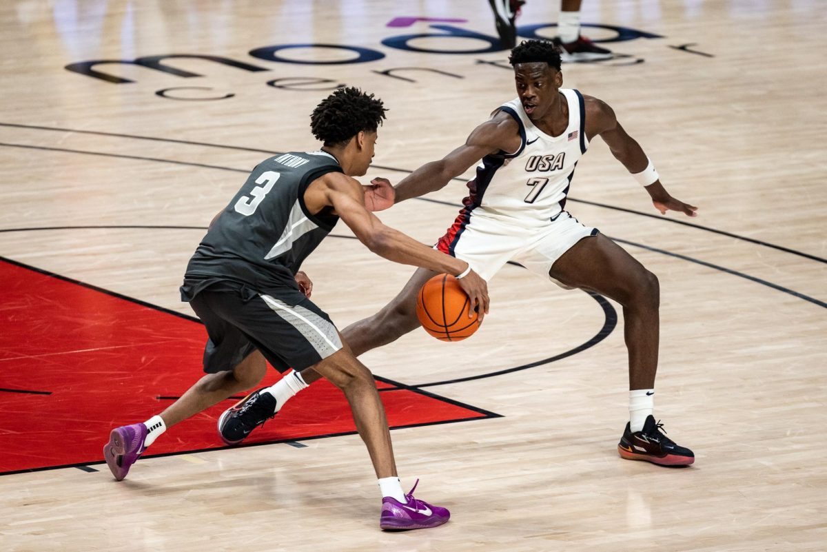 Highly anticipated prospect, AJ Dybantsa (7) , presses up on Kiyan Anthony (3). The top high school athletes in the world represent their respective countries at the Nike Hoop Summit held at the Moda Center in Portland, Ore., on April 12th, 2025. (Jonathan Suni, Emerald).
