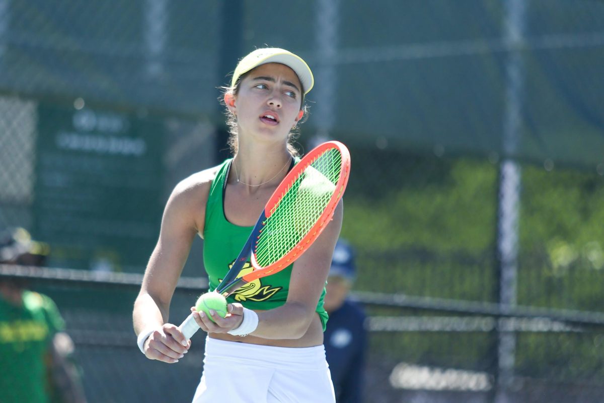 Patsy Daughters prepares to serve. Oregon Women's Tennis went against Iowa at the Student Tennis Center in Eugene, Ore. on Apr 18, 2025 (Tyler Graham/Emerald)