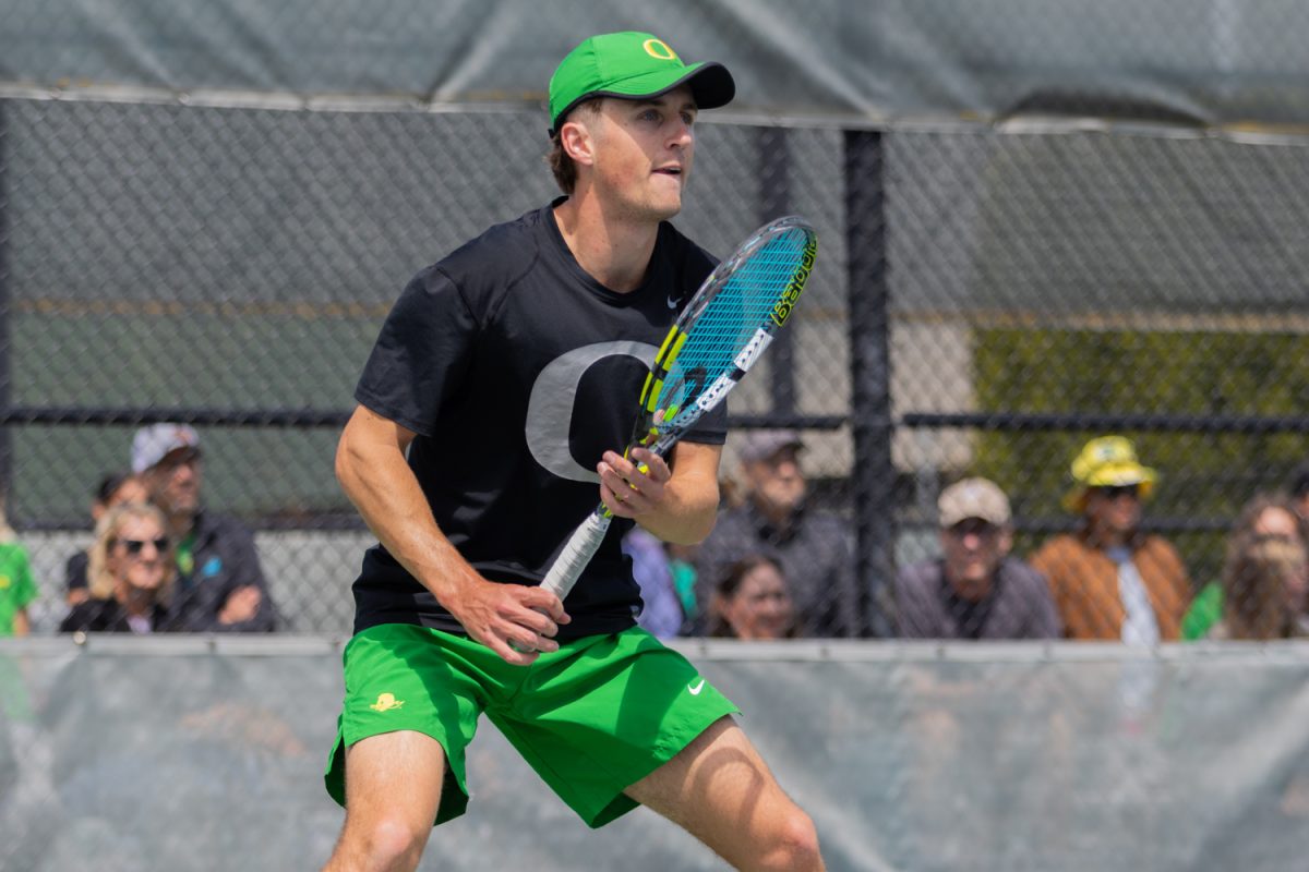 Matthew Burton prepares for a serve from his Wildcat opponent. Oregon Men’s Tennis come away victorious with a 4-1 defeat over Northwestern in Eugene, Ore., on April 20, 2025, securing their spot in the Big Ten Tournament. (Julia Massa/Emerald)