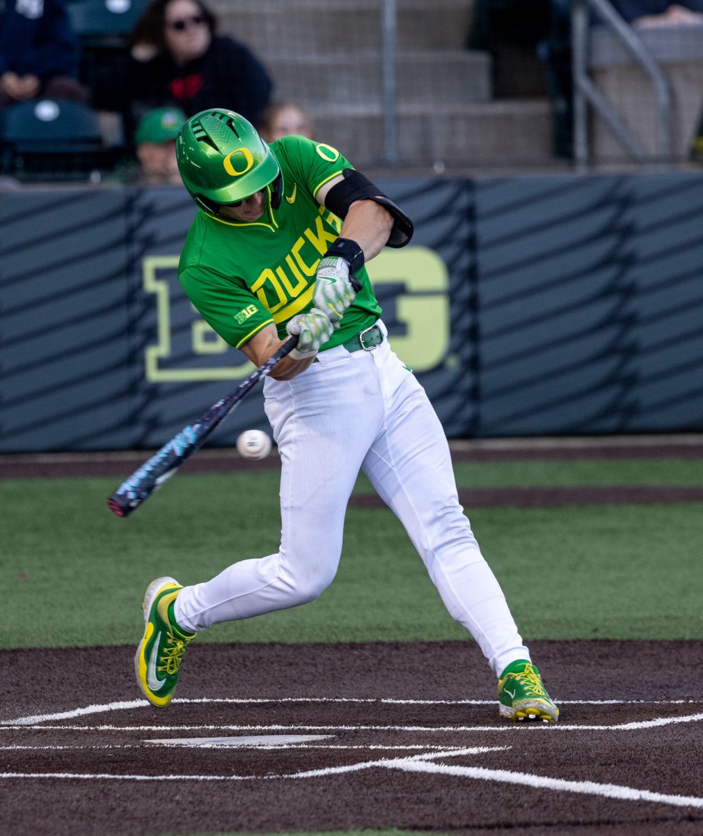 Oregon Duck Drew Smith (17) swings to hit the ball against Portland during their match up at PK Park in Eugene, Ore., on April 22, 2025.