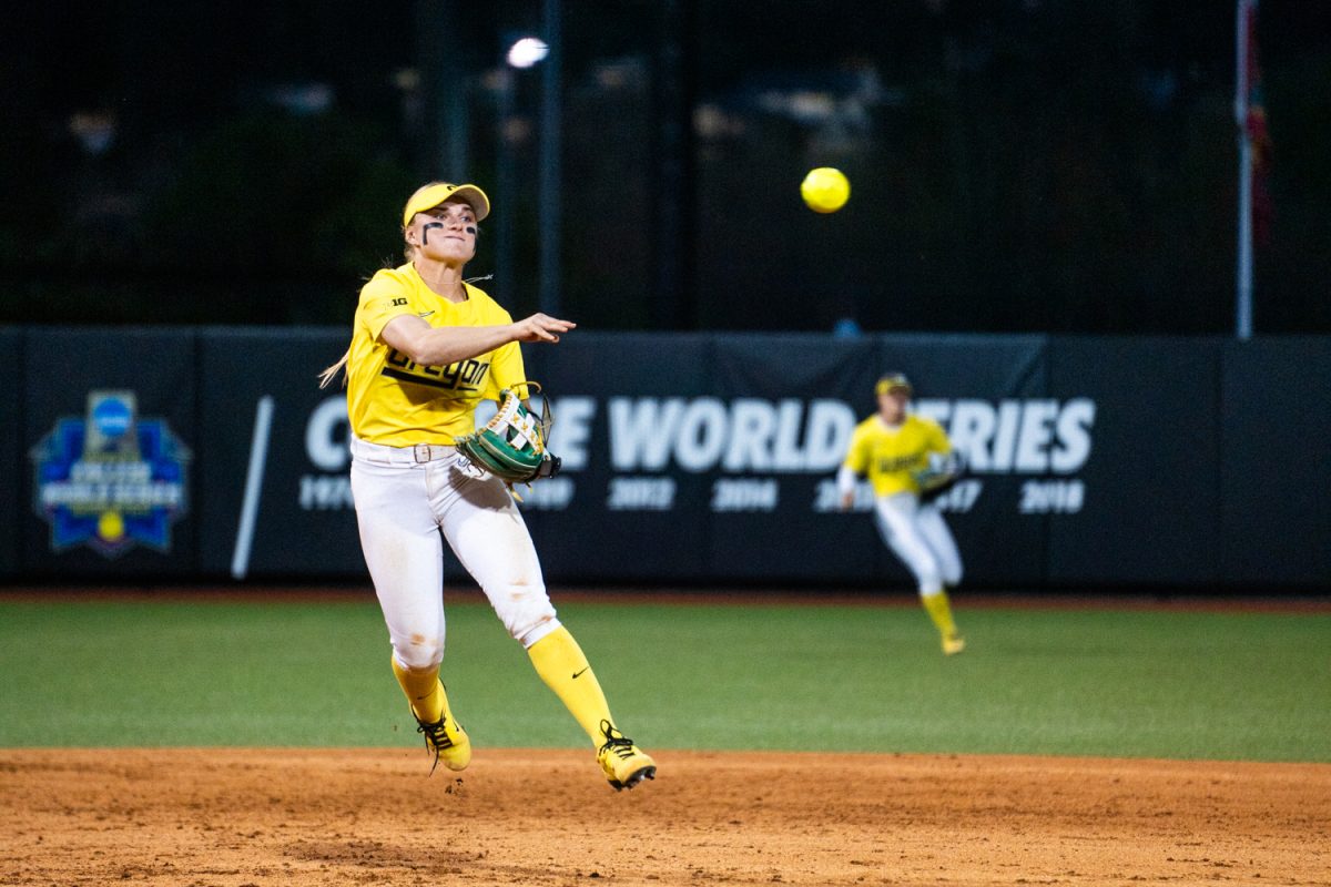 Oregon infeilder Paige Siniki (38) jumps while throwing the ball to first to stop the UCLA run. The #5 ranked University of Oregon Ducks Women’s Softball team win 3-1 in a home game against the #6 ranked UCLA Bruins in Eugene, Ore., on April. 18, 2025. (Rowan Campbell/Emerald).