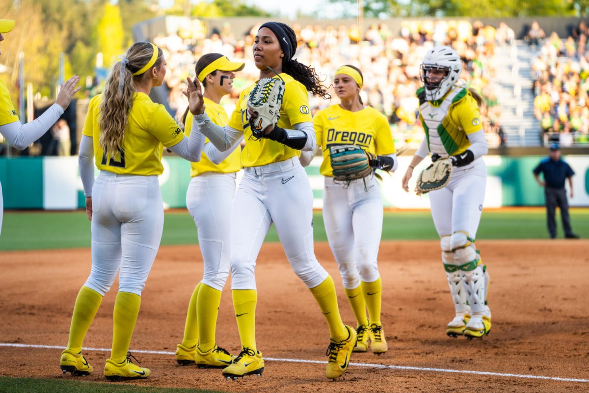 Oregon's Ayanna Shaw (11) runs back to the dugout during the field exchange. The #5 ranked University of Oregon Ducks Women’s Softball team take on a home game against the #6 ranked UCLA Bruins in Eugene, Ore., on April. 18, 2025. (Rowan Campbell/Emerald).