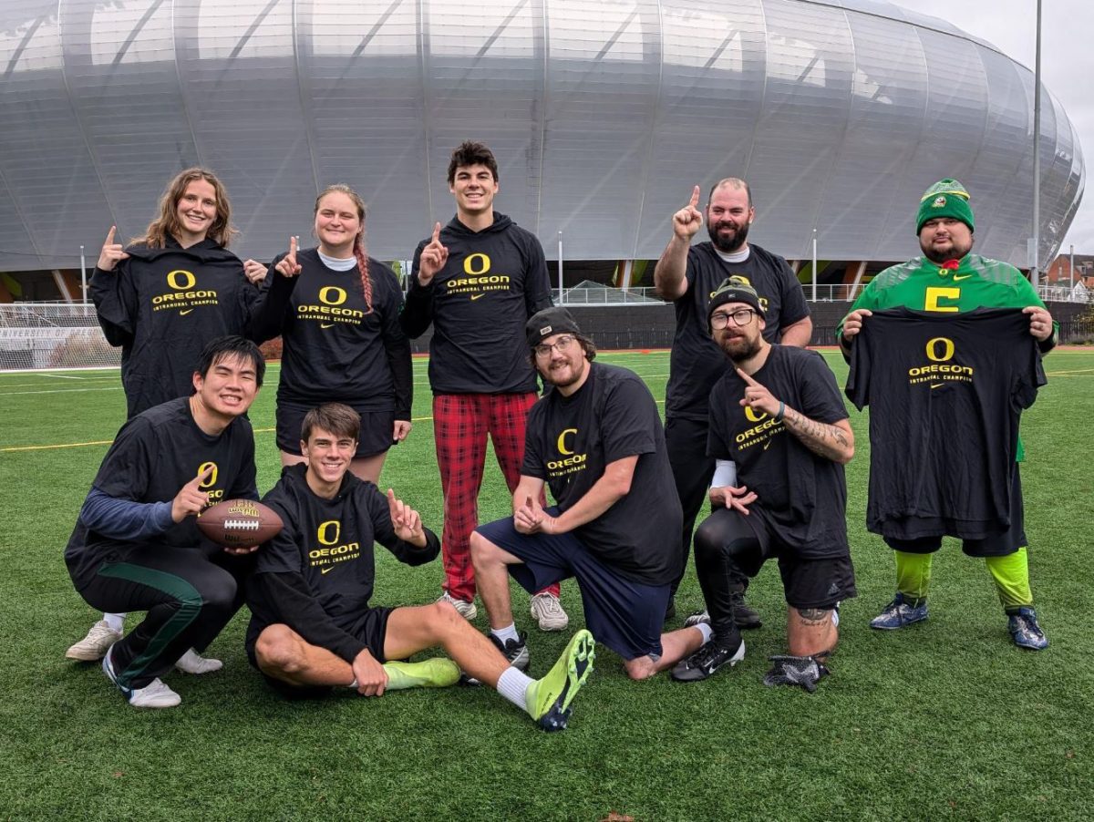 The winning Unified Intramural Flag Football team poses with their winner's t-shirts. (Photo courtesy of Sean Graninger)