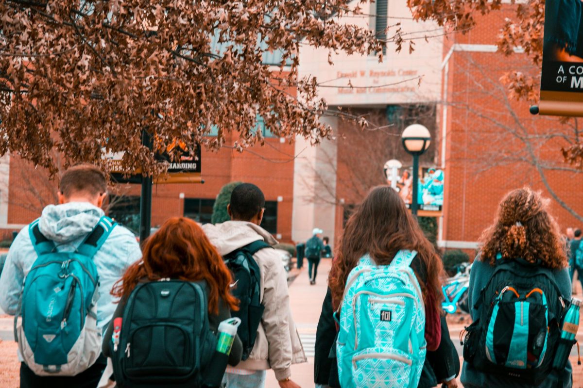 https://www.pexels.com/photo/people-wearing-backpacks-1454360/