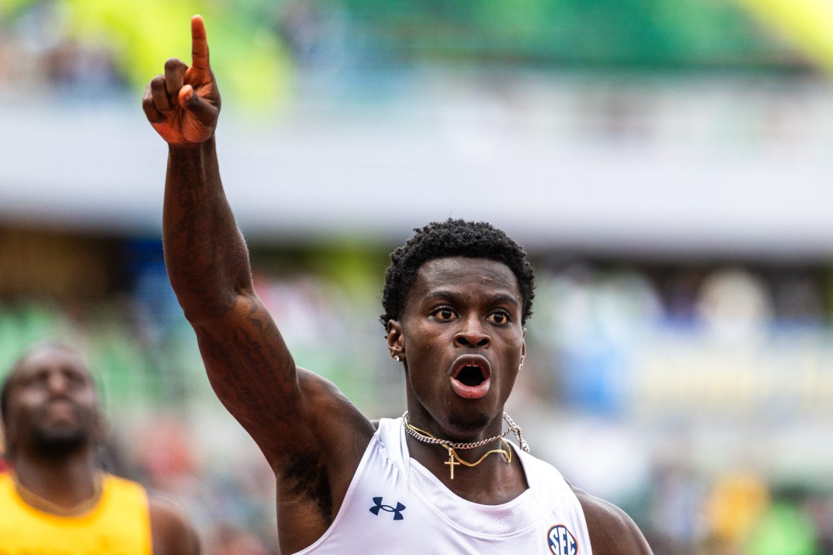 Ja'Kobe Tharp of Auburn celebrates after winning the men’s 110-meter hurdles at the NCAA Outdoor Track and Field Championships at Hayward Field on Friday, June 13, 2025, in Eugene, Ore. Tharp ran 13.05 seconds to break the collegiate record. (Max Unkrich / Daily Emerald)