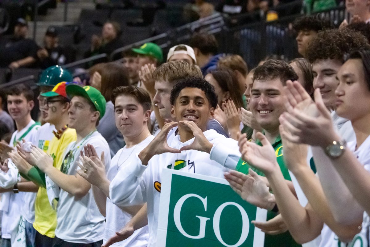 Student section Ducks getting hype hype before first serve. The University of Oregon Ducks played the Ohio State Buckeyes at Matthew Knight Arena in Eugene, Ore. on Oct. 4, 2025. (Fred Hall/Emerald)