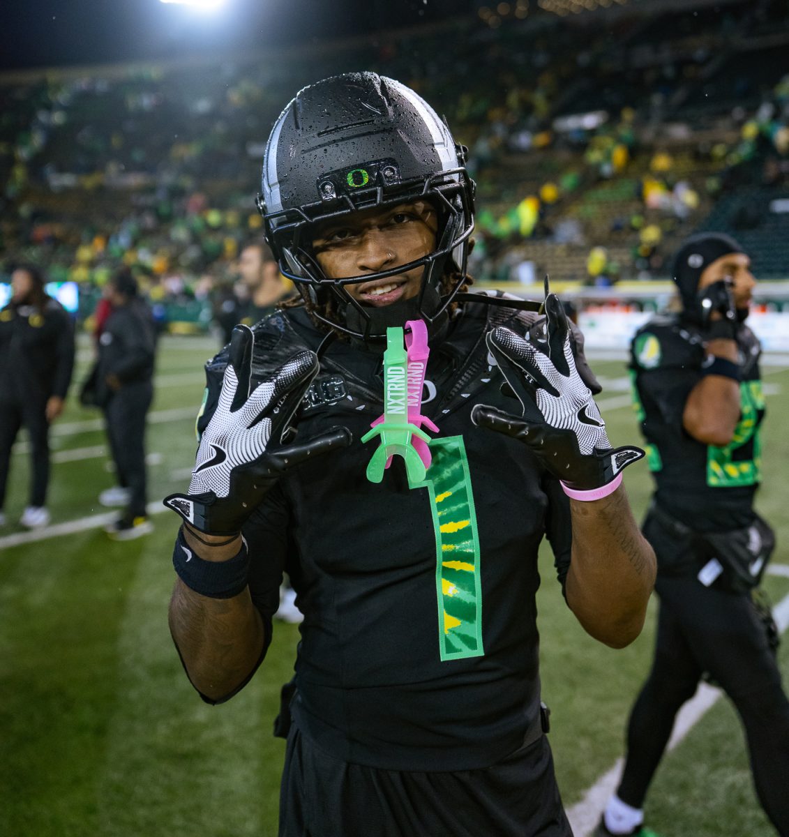 Oregon Ducks wide receiver Dakorien Moore (1) smiles for a photo after the game concludes. The University of Oregon Ducks took on the University of Wisconsin-Madison Badgers at Autzen Stadium on Oct. 25, 2025, with the Ducks beating the Badgers 21-7. (Saj Sundaram/Emerald)