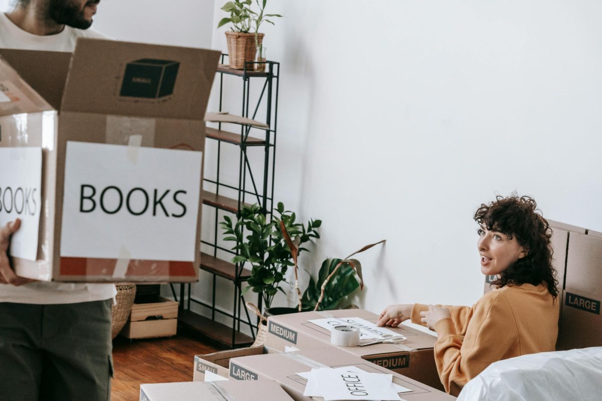 https://www.pexels.com/photo/couple-packing-up-and-putting-labels-on-boxes-7217887/