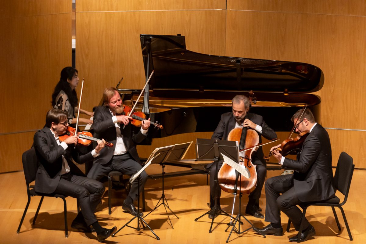 Pianist, Eunhye Grace Choi, and the Zemlinsky Quartet perform. This duo performance was held in Beall Concert Hall in Eugene, Ore., on Nov. 4. (Anna Liv Myklebust / Emerald)