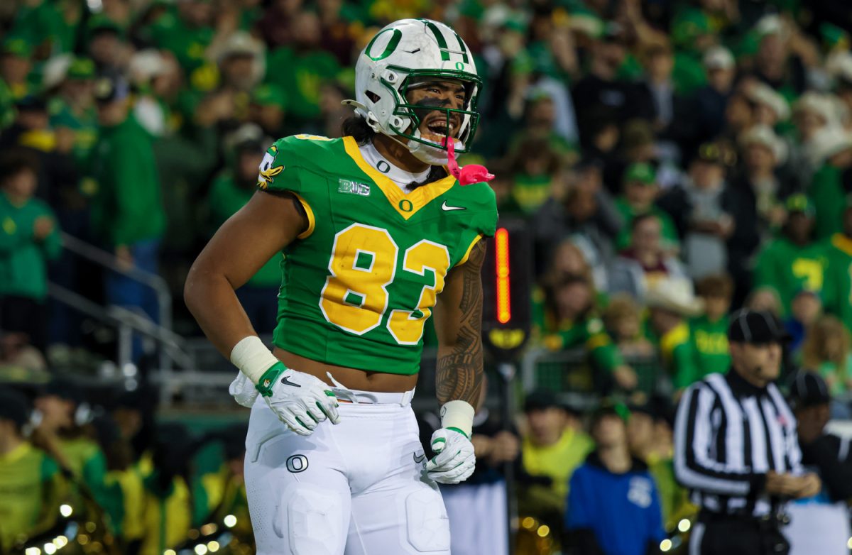 Roger Saleapaga (83), sophomore tight end, celebrates a Ducks touchdown. The University of Oregon Ducks host the University of Minnesota Gophers in a Friday night matchup on Nov. 14, 2025, at Autzen Stadium in Eugene, Ore. (Julia Massa/Emerald)