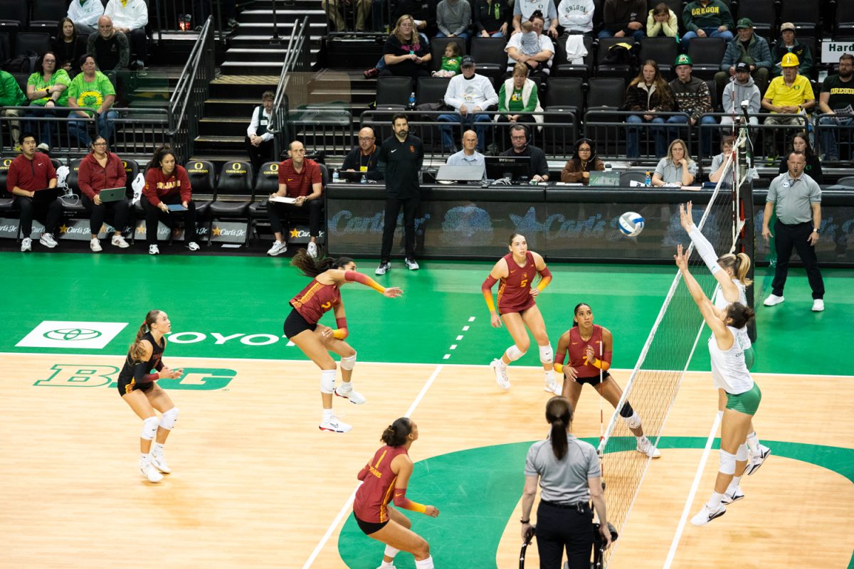 Trojan outside hitter London Wijay (2)  hits a powerful ball from the backrow. The Oregon Ducks faced the USC Trojans on Nov. 19, 2025, in an intense match at Matthew Knight Arena in Eugene, Ore. (Katie Poluyansky/Emerald)