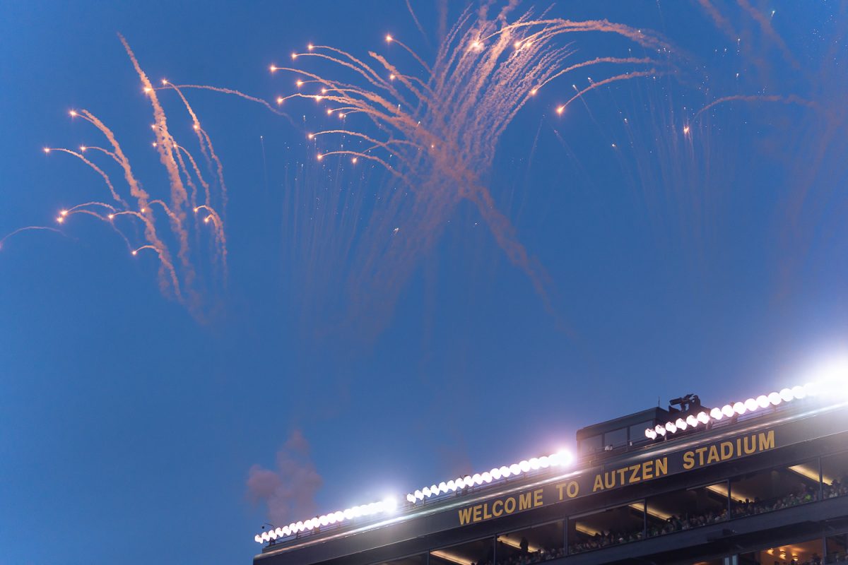 Fireworks explode above Autzen Stadium as the Oregon team runs out from their tunnel. The No. 5 University of Oregon Ducks demolished the No. 12 James Madison University Dukes 51-34 in the first round of the College Football Playoff at Autzen Stadium in Eugene, Ore., on Dec 20, 2025. (Saj Sundaram/Emerald)