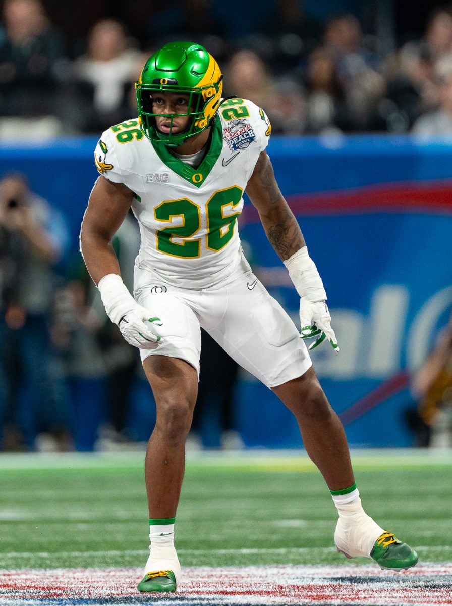 Oregon Ducks linebacker Devon Jackson (26) sizes up his opponents before the start of the play. The No. 5 University of Oregon Ducks lost 22-56 to the No. 1 Indiana University Hoosiers in the third round of the College Football Playoff at the Peach Bowl held at Mercedes-Benz Stadium in Atlanta, Ga. on Jan 9, 2026. (Saj Sundaram/Emerald)