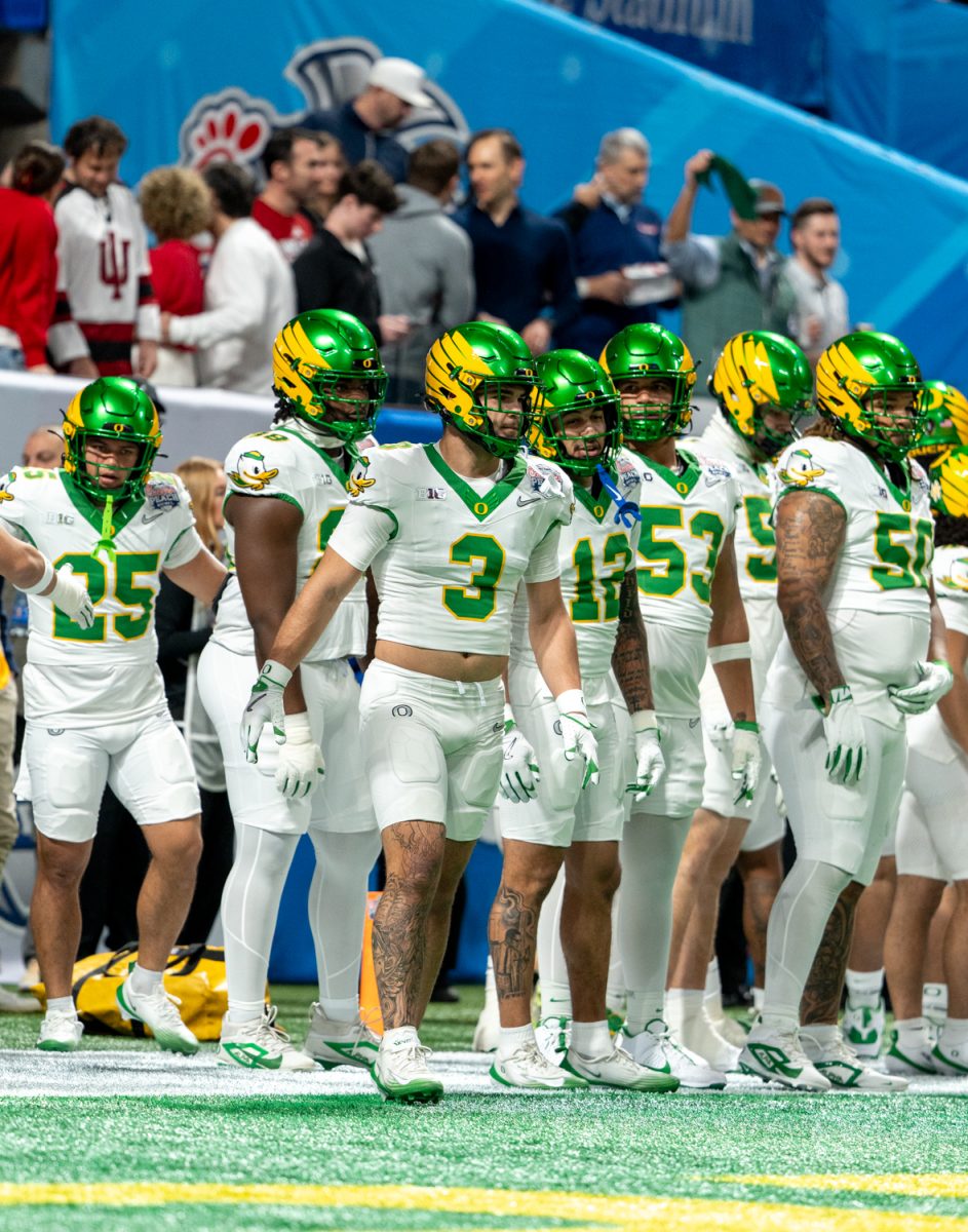 Oregon players warm up before the Oregon vs. Indiana Match up. The No. 5 University of Oregon Ducks take on the No. 1 Indiana University Hoosiers in the third round of the College Football Playoff at the Peach Bowl held at Mercedes-Benz Stadium in Atlanta, Ga. on Jan 9, 2026. (Saj Sundaram/Emerald)