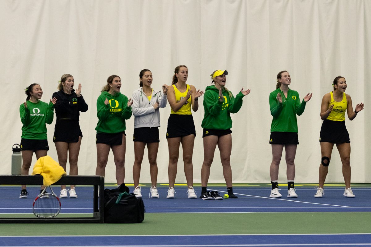 Oregon's team supports Tilde Jagare during her final set. The University of Oregon Women's tennis team started their season against Portland State University at the Student Tennis Center in Eugene, Ore, on January 16, 2026. (Owen Burriss/Emerald)