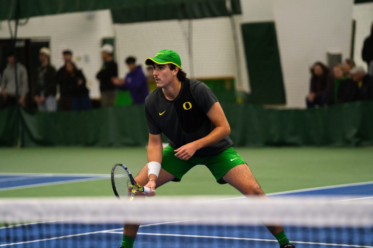 Duck senior Pierre Mouesca anticipates the opponents move. On January 17, 2026, the University of Oregon's men's tennis team played against the University of Portland in the student tennis center in Eugene, Ore. (Katie Poluyansky/Emerald)