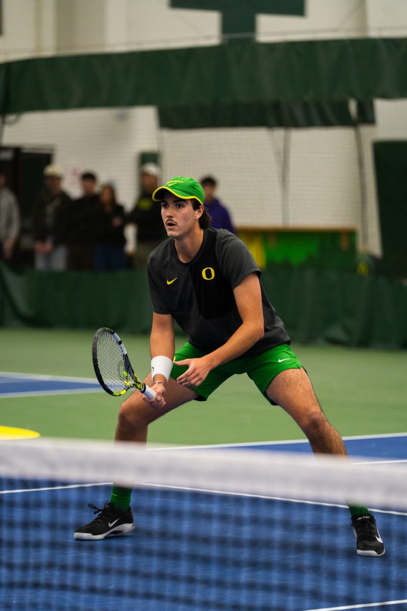 Duck senior Pierre Mouesca anticipates the opponents move. On Janurary 17, 2026, the University of Oregon's men's tennis team played against the University of Portland in the student tennis center in Eugene, Ore. (Katie Poluyansky/Emerald)