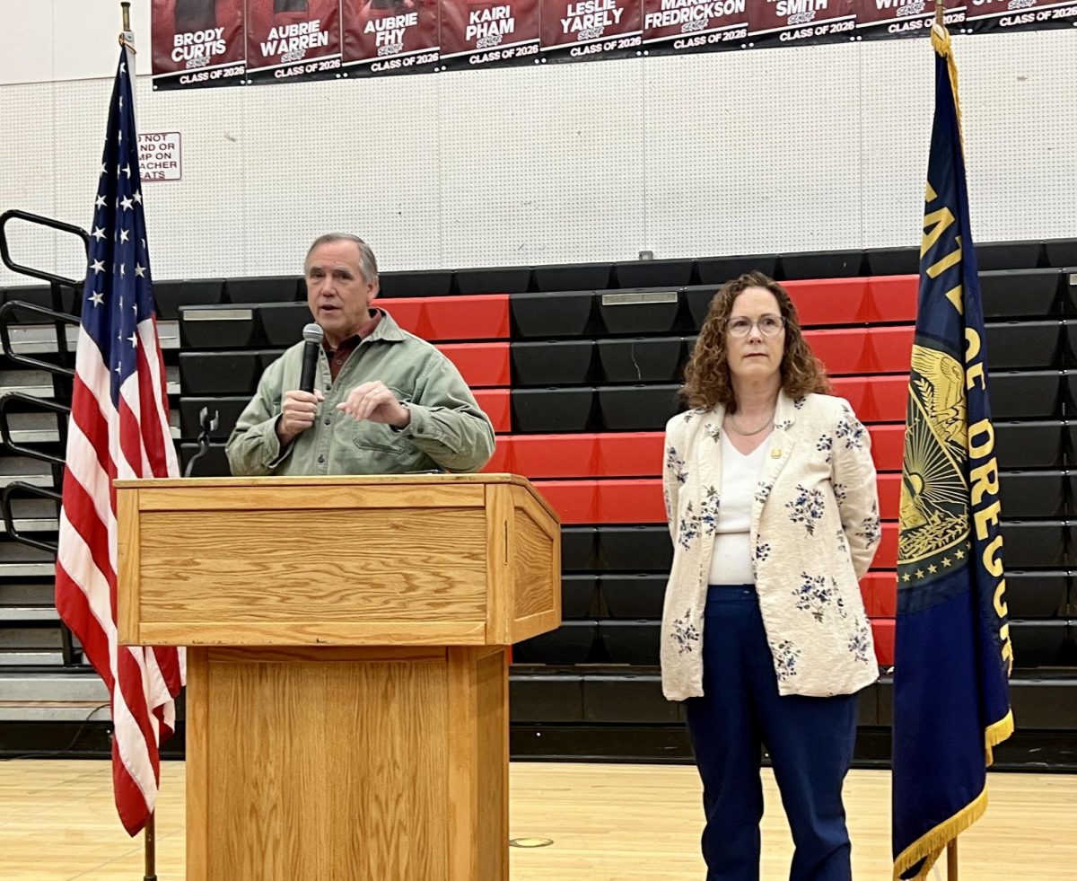 U.S. Sen. Jeff Merkley, left, and U.S. Rep. Val Hoyle, right, at a town hall at Thurston High School in Springfield on Jan. 18, 2026. (Lucas Hellberg/The Daily Emerald)