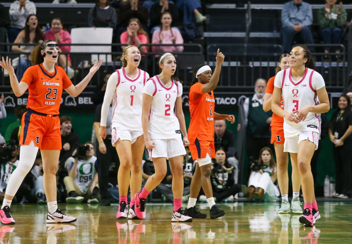 A mix of emotions as Oregon celebrates the ball going out of bounds, whilst Illinois questions the officials decision. Oregon Ducks Women’s Basketball take on the Illinois Fighting Illini at Matthew Knight Arena in Eugene, Ore., on Feb. 4, 2026. (Tyler Graham/Emerald) 