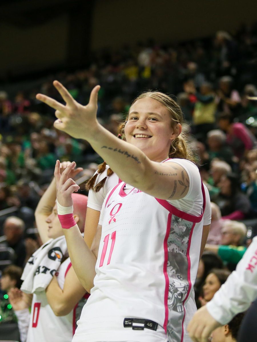 Oregon guard Sammie Wagner (11) celebrates a teammates made three from the bench. Oregon Ducks Women’s Basketball take on the Illinois Fighting Illini at Matthew Knight Arena in Eugene, Ore., on Feb. 4, 2026. (Tyler Graham/Emerald)