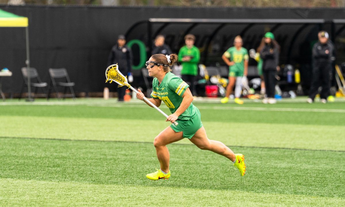 Senior midfielder Anna Simmons (30) looks to pass to a teammate. On Feb. 7th, 2026 the University of Oregon women's lacrosse team hosted a season-opening game against Arizona State University on Papé Field in Eugene, Ore. (Katie Poluyansky/Emerald)