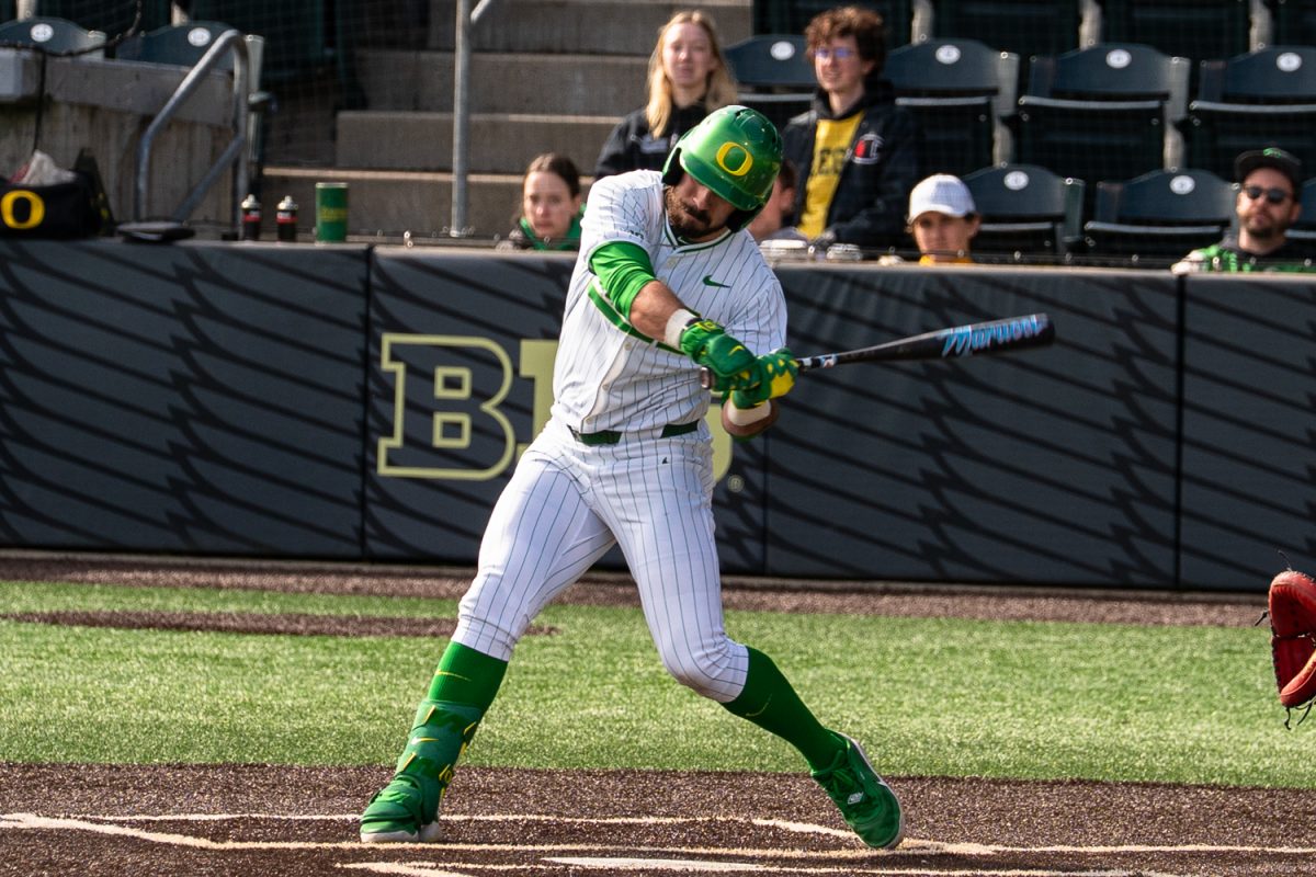 University of Oregon senior infielder Dominic Hellman (45) swings. On Feb. 21 2026, University of Oregon men's baseball team took on Youngstown State Penguins for the third game in the series at PK Park in Eugene, Ore. (Katie Poluyansky/Emerald)