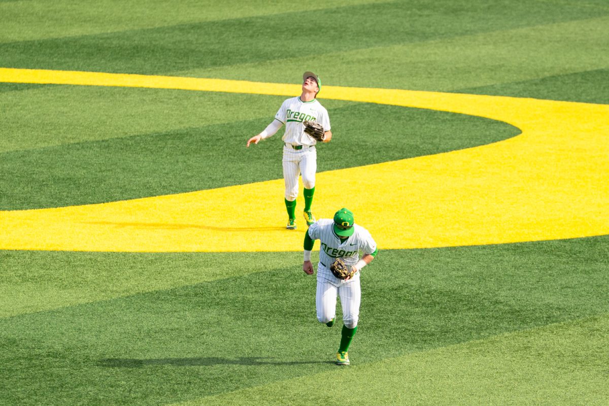The Ducks attempt to catch a high ball. On Feb. 21 2026, University of Oregon men's baseball team took on Youngstown State Penguins for the third game in the series at PK Park in Eugene, Ore. (Katie Poluyansky/Emerald)