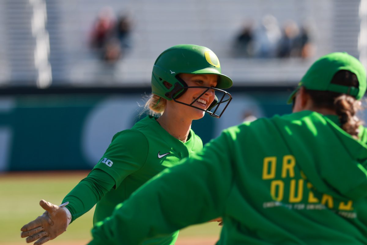 Ducks infielder Addison Amaral (4) rounds third base after hitting a home run. Oregon Softball takes on Stetson University in the Oregon Classic at Jane Sanders Stadium in Eugene, Ore., on Feb. 27, 2026, winning 10-1. (Julia Massa/Emerald)