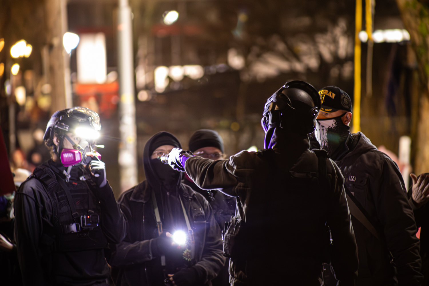 Protestors fight counterprotestors outside  ICE facility on Jan. 31 (Maria Weyne/Emerald)