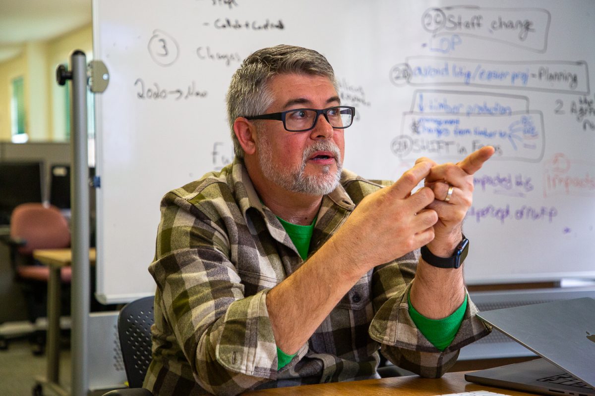 Ken Kato, the founder and director of the University of Oregon's Location and Innovation Lab, explains the process behind UO’s mapping program on Feb. 26, 2026. The map records data on over 29,000 rooms, over 350 buildings and underground utilities on UO campus. (Corey Hoffman/Emerald)