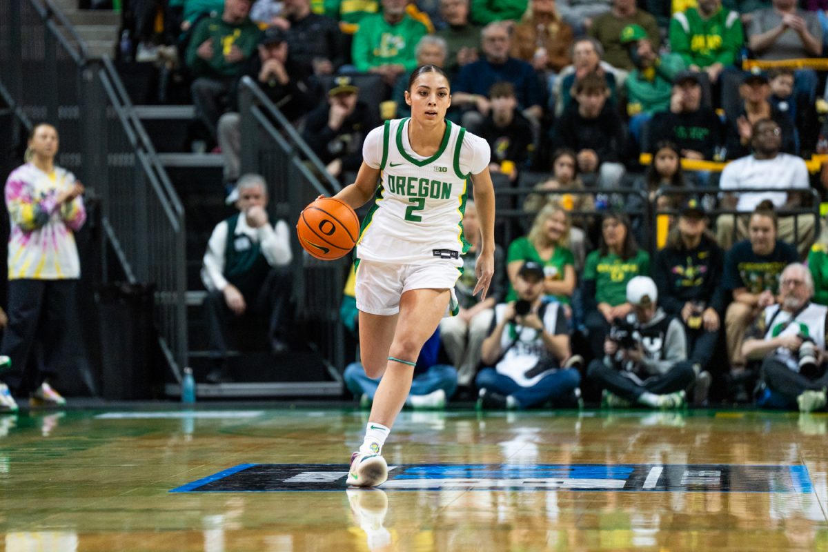 Oregon guard Katie Fiso (2) moves the ball up court. The University of Oregon Ducks Women’s Basketball team lose against the University of Washington Huskies 69-70 at Matthew Knight Arena in Eugene, Ore., on Mar. 1, 2026. (Rowan Campbell/Emerald).