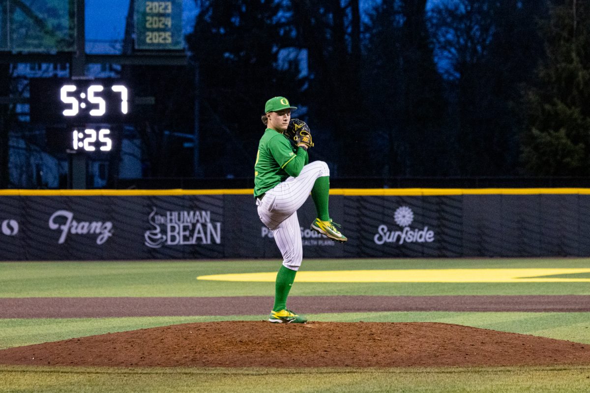 Oregon freshman pitcher Shane Johnson (52) winds up for his pitch. Oregon Duck baseball hosted in-state rivals the Oregon State Beavers at PK Park in Eugene, Ore. on March 3, 2026, losing 10-6. (Owen Burriss/Emerald)