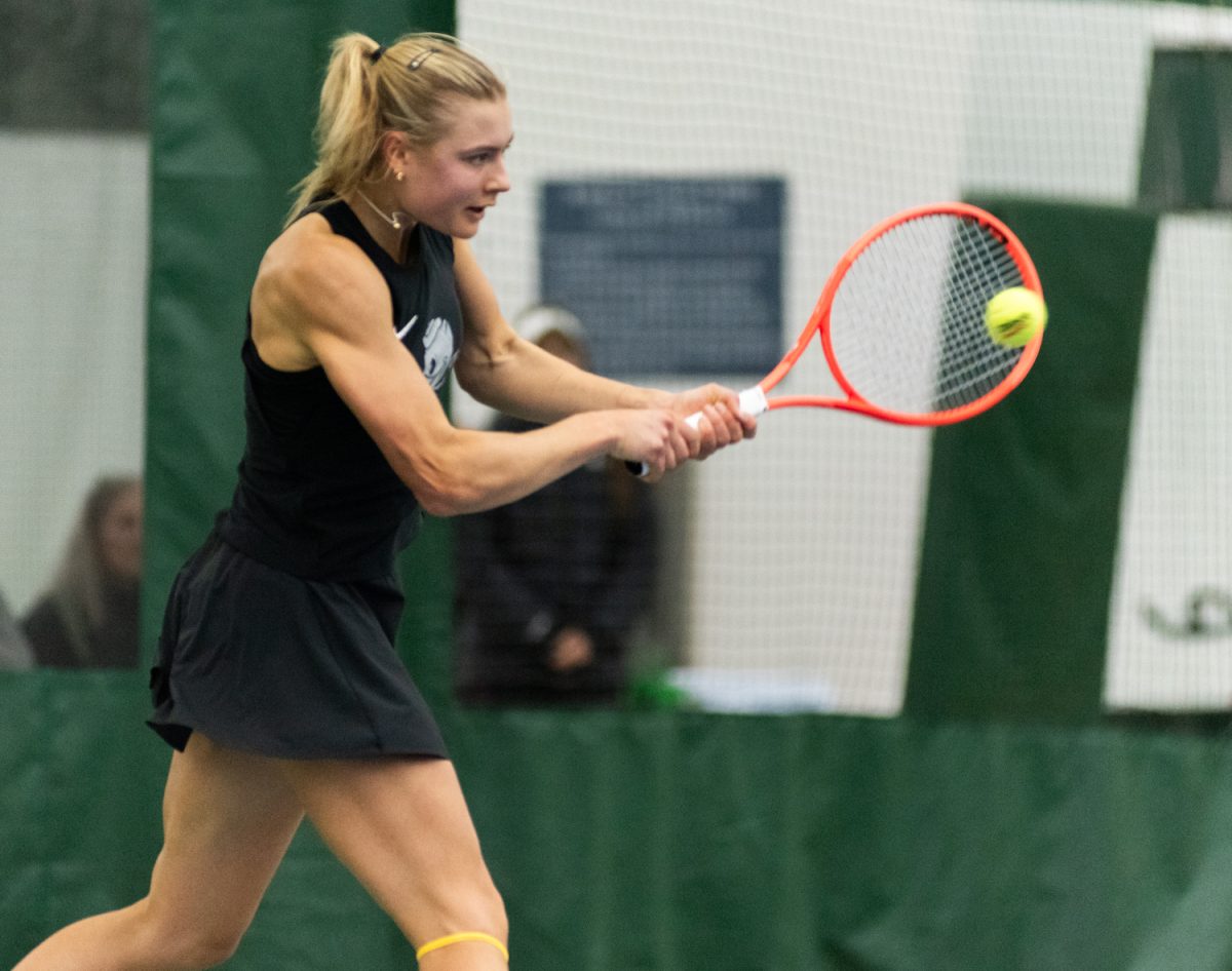 Oregon Duck Tilda Jagare strikes the ball for a powerful shot during singles. Oregon Ducks Women's Tennis take on the Maryland Terrapins at the Student Tennis Center in Eugene, Ore. on March 6th, 2026. Oregon would lose 4-2 to Maryland. (Chris Castro/Emerald)