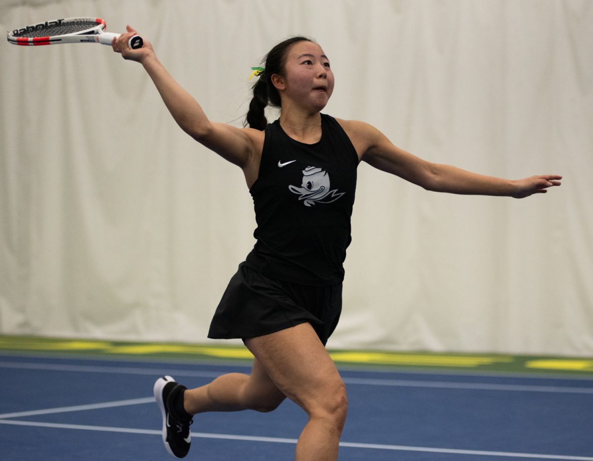 Oregon Duck Hinata Fututani runs toward the ball ready to strike during a singles match. Oregon Ducks Women's Tennis take on the Maryland Terrapins at the Student Tennis Center in Eugene, Ore. on March 6th, 2026. Oregon would lose 4-2 to Maryland. (Chris Castro/Emerald)