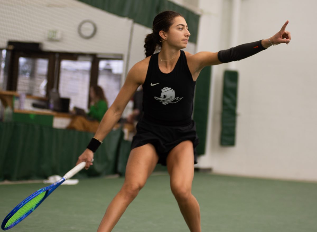 Oregon Duck Patsy Daughters signals that a ball was out during singles. Oregon Ducks Women's Tennis take on the Maryland Terrapins at the Student Tennis Center in Eugene, Ore. on March 6th, 2026. Oregon would lose 4-2 to Maryland. (Chris Castro/Emerald)