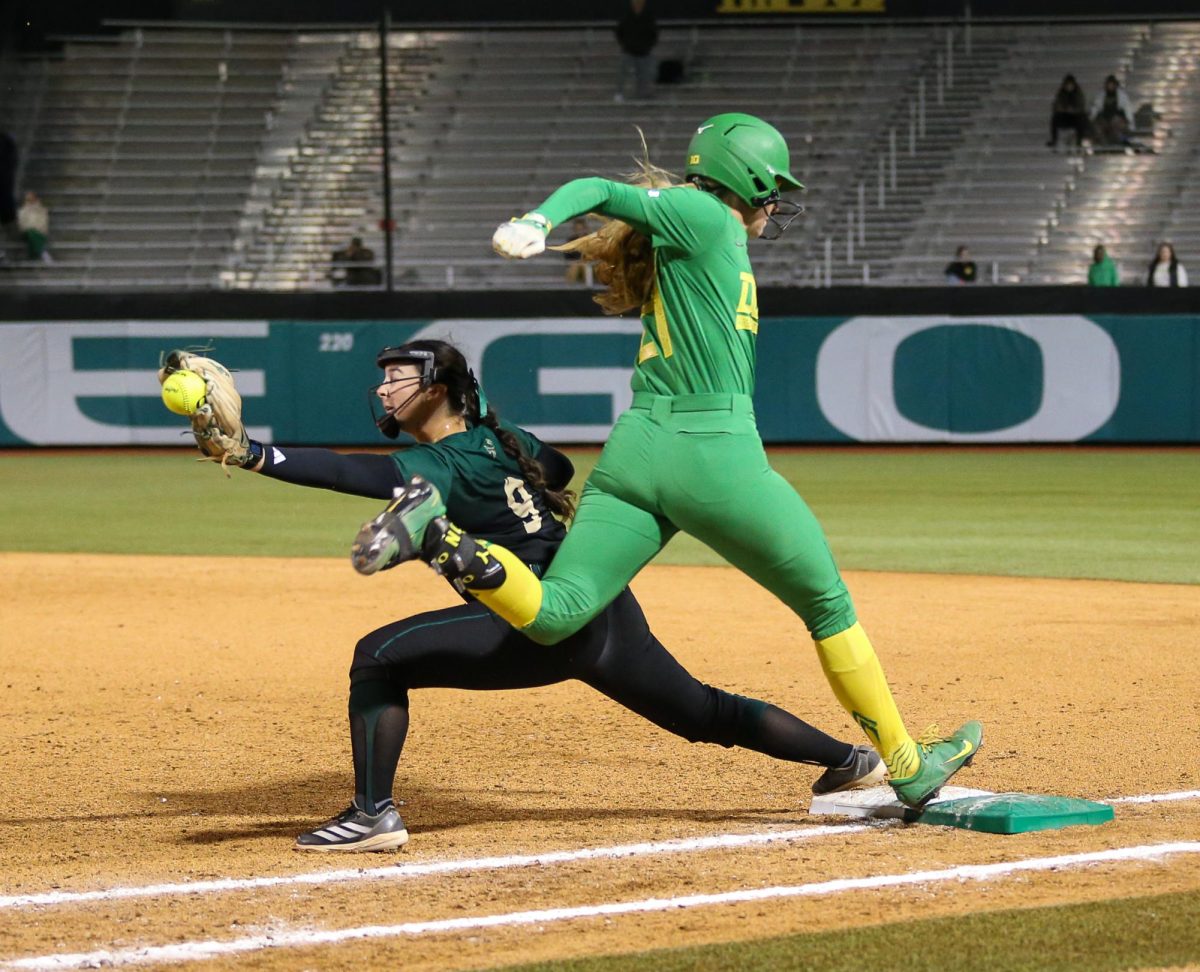 Oregon PH Emma Cox (21) beats out a tight call at first base. Oregon Ducks Softball take on the Sacramento State Hornets at Jane Sanders Stadium in Eugene, Ore., on Mar. 6, 2026. (Tyler Graham/Emerald)