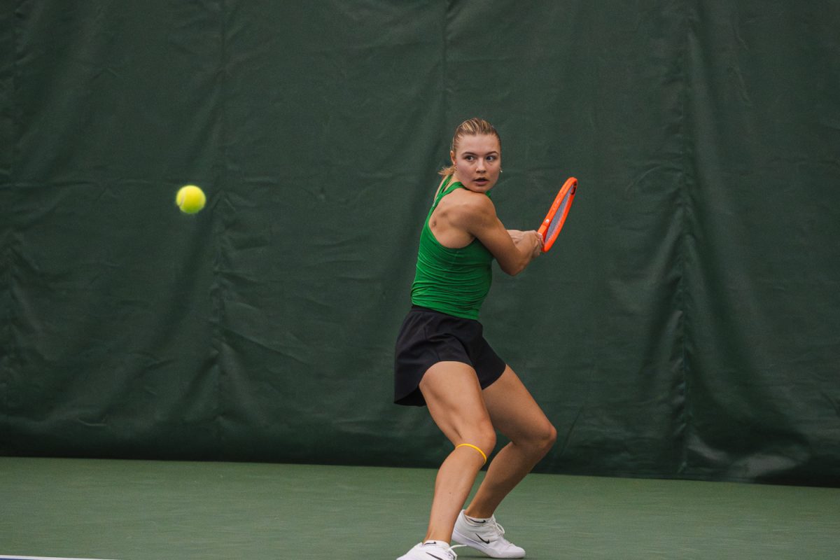 Junior Tilde Jagare focuses before hitting a backhand.  The University of Oregon Women’s Tennis team defeated No. 63 Rutgers University 4-0 on March 8, 2026, in Eugene, Ore. (Lilly Wall/Emerald)